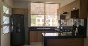 Departamento en condominio con alberca y área infantil