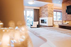 Honeymoon Suite with Infrared Cabin and Mountain View room in Superior Hotel Schneider