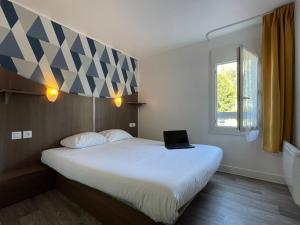 Hotels Kyriad Direct Val de Reuil : photos des chambres