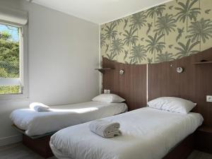 Hotels Kyriad Direct Val de Reuil : photos des chambres