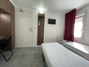 Hotels Kyriad Direct Val de Reuil : photos des chambres