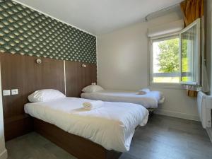 Hotels Kyriad Direct Val de Reuil : photos des chambres