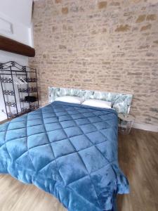 B&B / Chambres d'hotes Appartement Oingt - Les Meubles des Pierres Dorees : photos des chambres