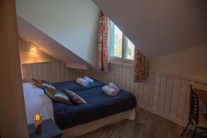 Appartements La Baie des Voiles, FEET IN THE CRYSTAL WATERS, 9 Apts from studio to Duplex by LLA SELECTIONS : photos des chambres