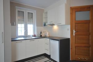 Two-Bedroom Duplex Apartment with Lake View room in Pensjonat Vertigo Narie
