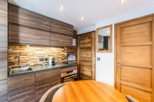 Appartements Le Hameau des Neiges : photos des chambres