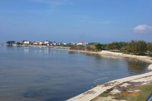 Jimmys Beach Familientraum direkt am Meer mit beheiztem Pool