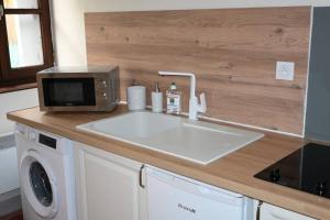 Appartements Le cosy cour privee clim wifi 3 etoiles : photos des chambres