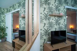 Appartements ONLOC - Appart Reveil proche Halles avec parking : photos des chambres