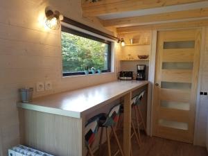 Maisons de vacances INSOLITE La Tiny House du Lutin Many et son Bain Nordique : photos des chambres