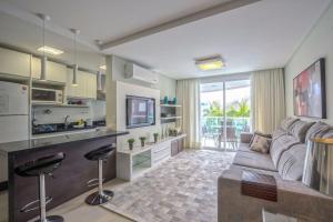 Boulevard 215C - Excelente apartamento em condomínio de luxo no centro de Bombinhas - Piscina - Jacuzzi - Academia - Portaria 24h.