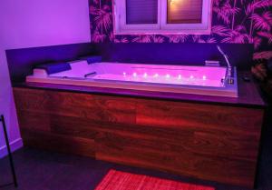 Appartements Suite Spa Privatif : photos des chambres