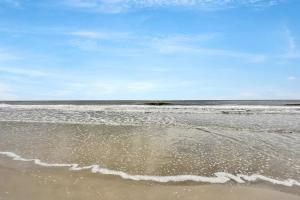 Beach house & backyard oasis with private pool - short walk to beach