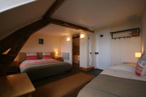 B&B / Chambres d'hotes Domfront - Numero CINQ : photos des chambres