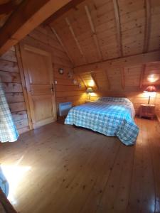 Chalets Maison de bois finlandaise au pied des pistes : photos des chambres