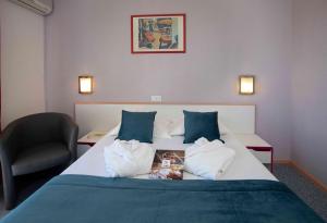 Hotels The Originals City, Relax'Otel & Spa, Le Barcares : photos des chambres