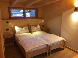 Appartamenti Cèsa Sorèie by AMA Val di Fassa