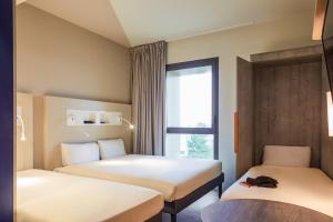 Hotels Ibis Budget Montpellier Aeroport Parc Des Expos : photos des chambres