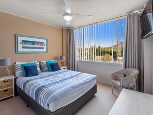 Magnus Gardens 4 beautiful air conditioned unit with filtered water views and Wi-Fi