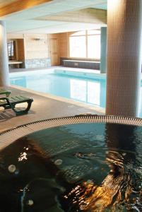Appartements travelski home premium - Residence Les Hauts de Comborciere : photos des chambres