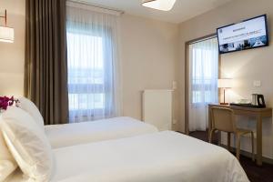 Hotels Neho Suites Porte de Geneve : photos des chambres