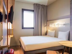 Hotels Ibis Budget Montpellier Aeroport Parc Des Expos : photos des chambres