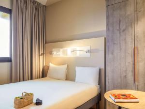 Hotels Ibis Budget Montpellier Aeroport Parc Des Expos : photos des chambres