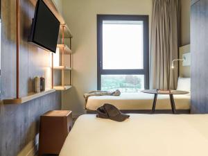 Hotels Ibis Budget Montpellier Aeroport Parc Des Expos : photos des chambres