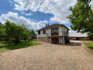 Villas Maison chaleureuse avec un grand jardin : photos des chambres