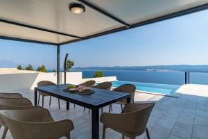 Seaview Villa Marila with a private pool with hydromassage, 3 en suite bedrooms, 1km from beach