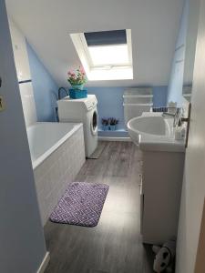 Appartements Petit coin de Paradis : photos des chambres