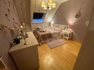 Appartements Petit coin de Paradis : photos des chambres