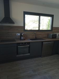 Maisons de vacances La maison en bois : photos des chambres