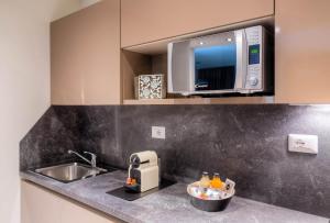 Superior Studio with kitchen & Pool Access room in Forte16 View & SPA