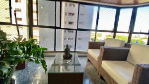 Apartamento vista mar, 2 Suítes, WC Social,2 vagas