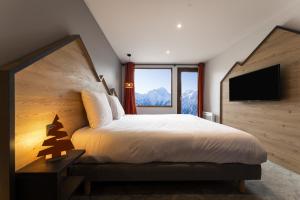 Hotels Hotel Base Camp Lodge - Les 2 Alpes : photos des chambres