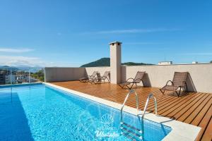 Estúdio MODERNO, com churrasqueira, Wifi, AC e Piscina, no Itaguá em Ubatuba, RECANTO 113