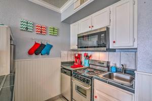 Colorful Coastal Condo Walk to Pier and Beach!