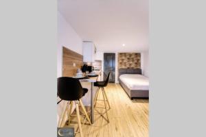 Appartements Mignon Studio au coeur de Metz (unenuitametz) : photos des chambres