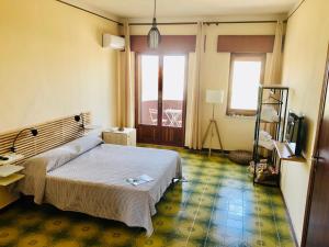 Quadruple Room with Balcony room in La Terrazza Sul Mar Mediterraneo