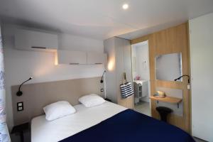 Campings CAMPING & SPA CAP SOLEIL : photos des chambres