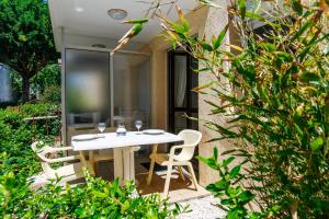 Appartements Plage Benoit a 80m, terrasse & jardinet : photos des chambres