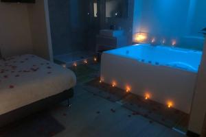 Appartements Nid d’amour- SPA- Superbe appartement avec jacuzzi : photos des chambres