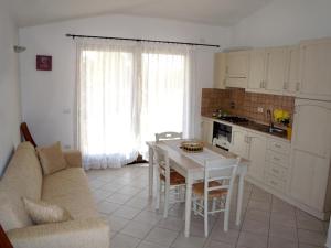 1CASADELFARO con Giardino a Pittulongu 600Metri dalla Spiaggia