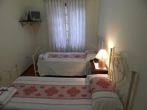 Camera Doppia con Letti Singoli con Bagno Privato