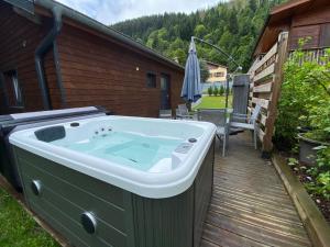 Chalets Le Petit Bouchot & Jacuzzi privatif proximite Gerardmer & La Bresse : photos des chambres