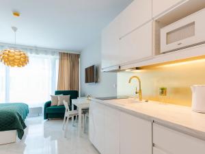 VacationClub – ApartPark Lividius Apartament 137