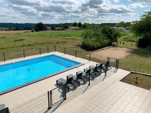 Maisons de vacances Magnifique villa de charme avec piscine : photos des chambres