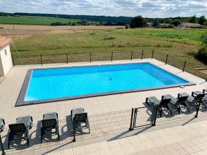 Maisons de vacances Magnifique villa de charme avec piscine : photos des chambres