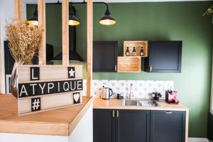 Maisons de vacances L'Atypique, charmante maison avec jardin clos : photos des chambres